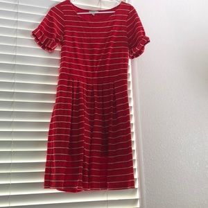 Red pleated anthro dress with scalloped detail